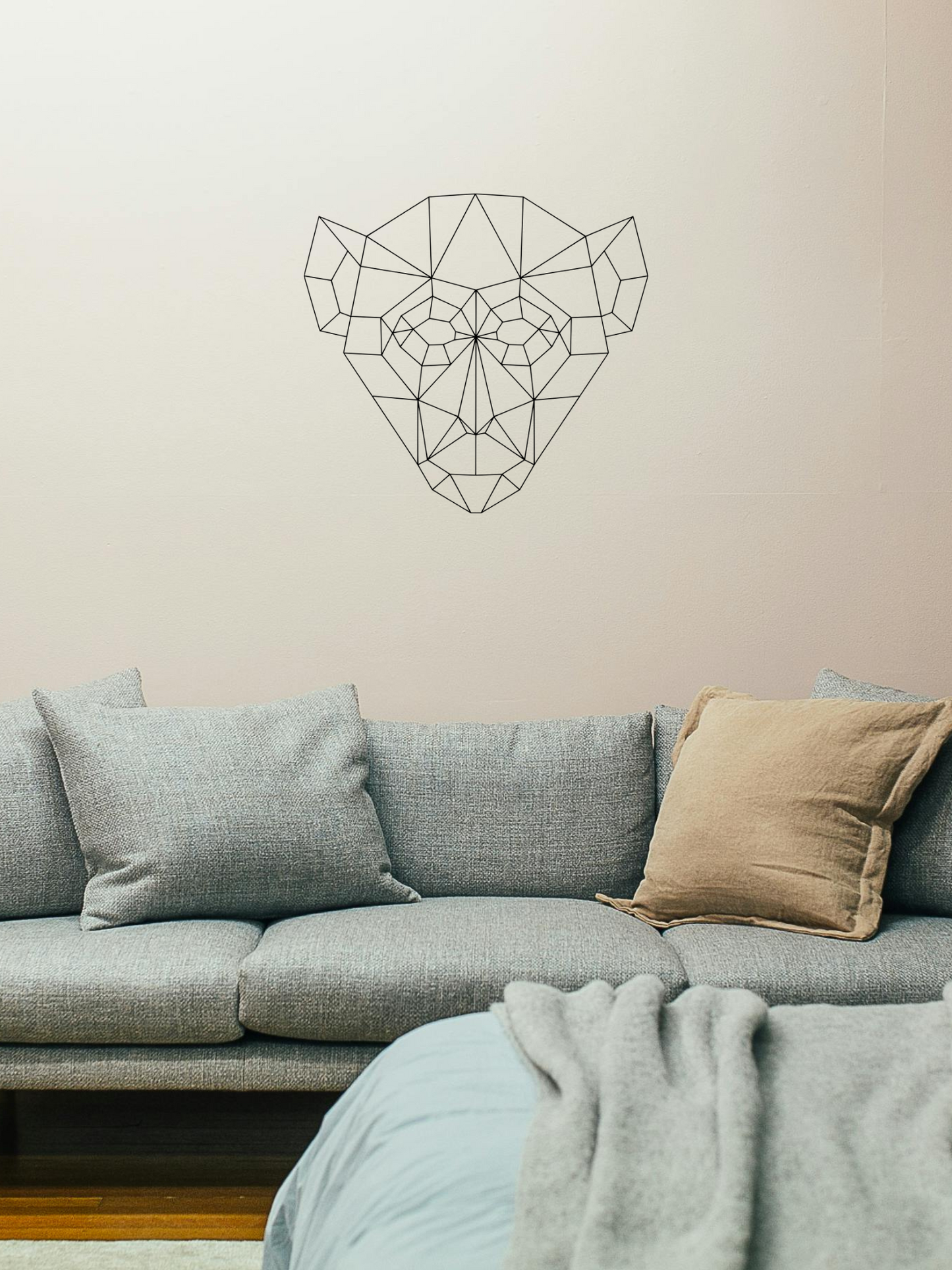 Houten geometrische aap als wanddecoratie in het zwart